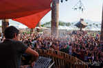 Jesse Wright plays the crowd during Sammy Bliss's and Jesse Wright's tag team Pocket DJ set on the Do Lab stage.