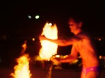 Firespinnin' in a Speedo!
(photo by Sabine Linn)